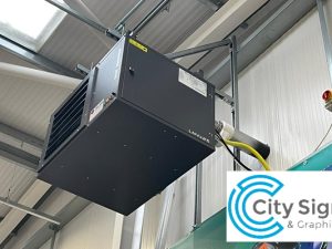 Air conditioning ventilation system near industrial ceiling