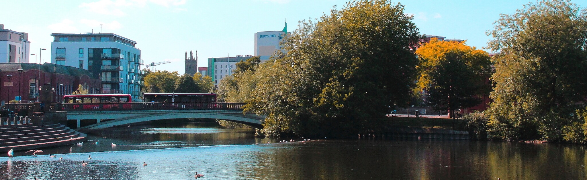 river in derby with bridge and skyline in background