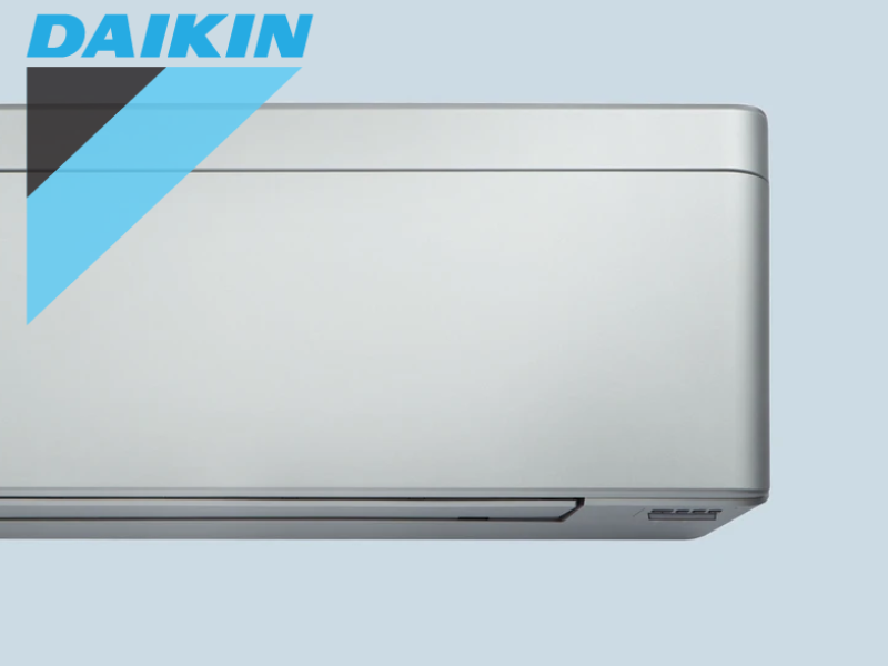 Picture of sleek modern air con unit with daikin logo over it